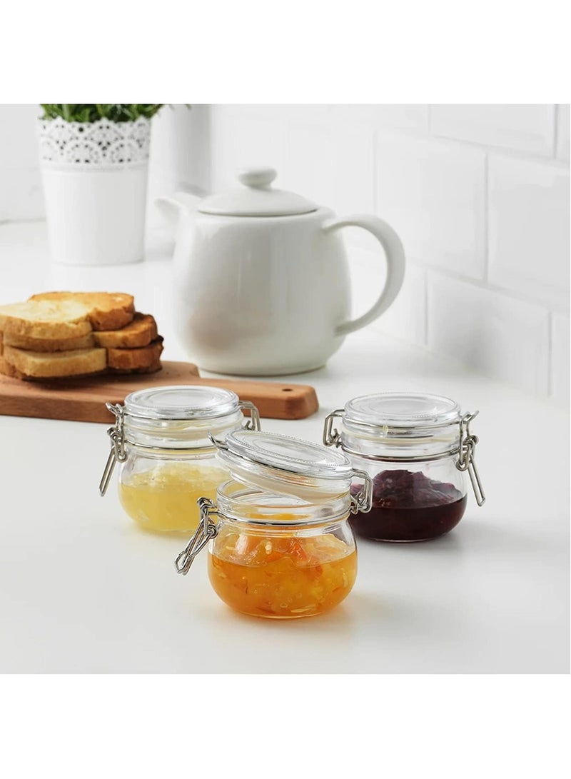 أيكيا برطمانات تخزين زجاجية شفافة أنيقة مع أغطية - مجموعة من 3 عبوات متعددة الأغراض للمنزل، وخزانة المؤن، وعرضها على سطح الطاولة - Image 2